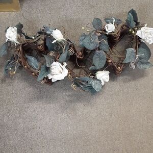 Vintage wood grapevine trailing triple heart shaped basket with white roses